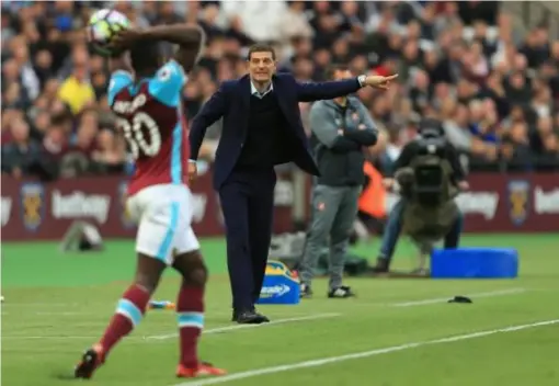  ??  ?? Slaven Bilic issues his orders from the sideline (Getty)