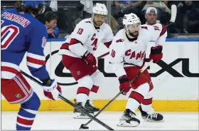  ?? JOHN MINCHILLO — THE ASSOCIATED PRESS ?? Hurricanes center Vincent Trocheck (16) sets up a shot on goal during the second period of Game 6 of Carolina’s second-round playoff series against the Rangers on May 28.