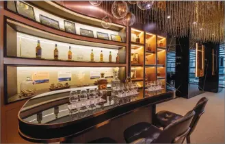  ??  ?? The Private Client Suite, located in the company’s office on George Street, showcases Scotland’s rarest and most exceptiona­l whiskies