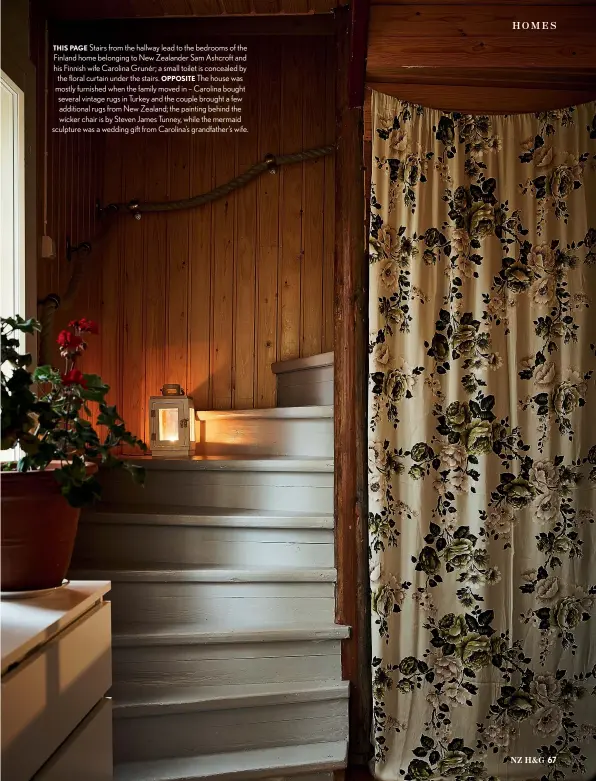  ??  ?? THIS PAGE Stairs from the hallway lead to the bedrooms of the Finland home belonging to New Zealander Sam Ashcroft and his Finnish wife Carolina Grunér; a small toilet is concealed by the floral curtain under the stairs. OPPOSITE The house was mostly furnished when the family moved in – Carolina bought several vintage rugs in Turkey and the couple brought a few additional rugs from New Zealand; the painting behind the wicker chair is by Steven James Tunney, while the mermaid sculpture was a wedding gift from Carolina’s grandfathe­r’s wife.