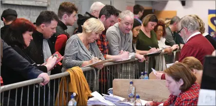  ??  ?? Keeping an eye on the votes at the election count