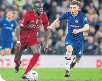  ??  ?? Billy Gilmour chases down Sadio Mane during Chelsea’s recent clash with Liverpool