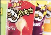  ?? Associated Press file photo ?? When Diamond Foods’ $1.5B offer for Pringles fell through, Kellogg swooped in Wednesday to acquire the brand from Procter & Gamble Co.