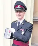  ??  ?? > Dr Ami Jones receives her MBE