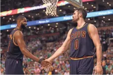  ?? ELSA, GETTY IMAGES ?? Kevin Love, right, with Tristan Thompson, scored a playoff career-high 32 points in Game 1 Wednesday vs. the Celtics.