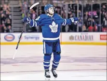  ?? THE CANADIAN PRESS VIA AP] [FRANK GUNN/ ?? Toronto’s William Nylander celebrates his game-winning goal in overtime against New Jersey on Thursday.