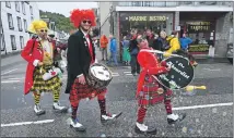  ?? ?? The Absurdist Pipe Band entertain with their antics.