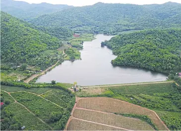  ?? PHOTOS BY PID THONG LANG PHRA FOUNDATION ?? An aerial view of a reservoir built to store water during periods of drought.