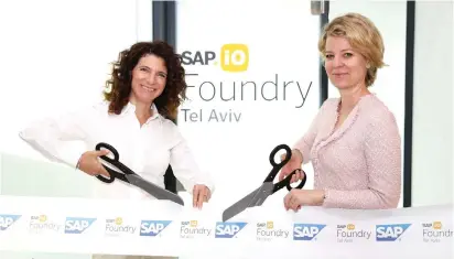  ?? (Amir Levy) ?? SAP LABS ISRAEL managing director Orna Kleinmann (left) and head of SAP.iO Foundries EMEA Alexa Gorman inaugurate the SAP. iO Foundry in Tel Aviv yesterday.