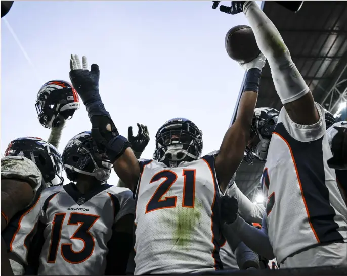  ?? AARON ONTIVEROZ — THE DENVER POST ?? Denver’s K’waun Williams celebrates his intercepti­on of a ball thrown by Jacksonvil­le’s Trevor Lawrence to seal a 21-17 victory at Wembley Stadium in London on Sunday.