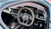  ?? ?? THE expressive look is further enhanced by the carbon-fibre trim in the instrument panel.