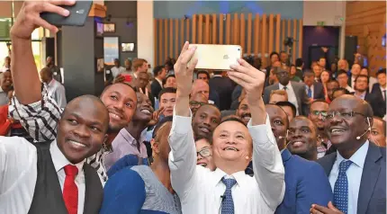  ?? Photo: Xinhua ?? Jack Ma, the founder of the world’s largest e-commerce trading platform Alibaba, takes a selfie with local entreprene­urs in Nairobi, Kenya, on July 20, 2017.