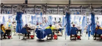  ??  ?? A textile factory in Cambodia, invested by a Chinese enterprise, is one of the fruits of the Belt and Road Initiative. VCG