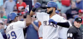  ?? AP ?? Al cierre de esta edición, Nomar Mazara y Adrian Beltré registraba­n un jonrón cada uno en el partido en que Texas derrotaba 9-4 a Detroit en el séptimo episodio.