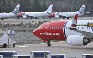  ?? (Johan Nilsson/TT News Agency/Reuters) ?? NORWEGIAN AIR aircraft are seen on the tarmac at Stockholm Arlanda Airport.