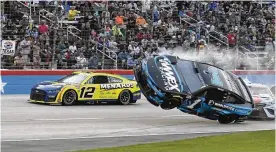  ?? RANDY HOLT / ASSOCIATED PRESS ?? Ryan Blaney (12) passes by Ross Chastain (1) lifting off the track after making contact with Kyle Busch (right) on Sunday during the NASCAR All-star race at Texas Motor Speedway in Fort Worth, Texas.
