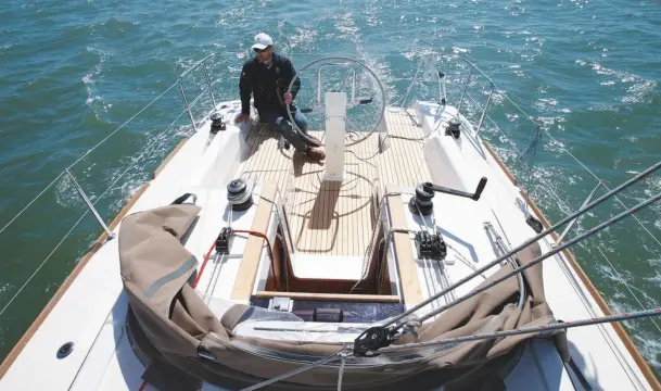  ??  ?? ABOVE: A clean and sensible cockpit. For shorthande­d sailing, leading the mainsheet back to the helm would be a good idea BELOW: A high coach roof makes space below decks