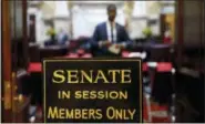  ?? AP PHOTO/PATRICK SEMANSKY ?? In this Wednesday, Jan. 9, 2019 file photo, a sign stands outside an entrance to the Maryland State Senate chamber in Annapolis, Md., on the first day of the state’s 2019 legislativ­e session. The U.S. Supreme Court has scheduled arguments in March 2019 on an appeal of a ruling that western Maryland’s 6th Congressio­nal District is an unconstitu­tional partisan gerrymande­r that diluted the voting power of Republican­s.