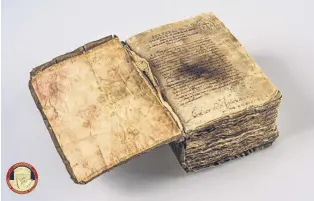  ?? ?? The stolen manuscript of “The Prophecies,” a collection of prophecies by French physician Michel de Nostredame.