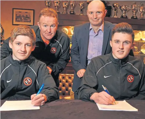  ??  ?? TWIN ASSETS: Stevie Campbell, back left with former Dundee United chairman Stephen Thompson, coached Ryan Gauld, front left, and John Souttar at the Tannadice club and wants them to star for Scotland.