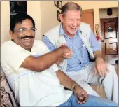  ??  ?? Captain Umesh Saxena and Peter Duffy share a joke when they meet up in 2006. For more than two decades, retired Air India pilot Saxena, who was forced to fly a hijacked plane from the Seychelles to Durban after an attempted coup, had the image of one...
