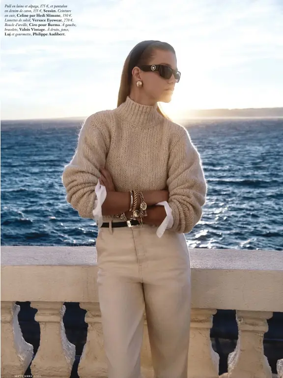  ??  ?? Pull en laine et alpaga, 175 €, et pantalon en denim de coton, 135 €, Sessùn. Ceinture en cuir, Celine par Hedi Slimane, 350 €. Lunettes de soleil, Versace Eyewear, 270 €. Boucle d’oreille, Ciro pour Burma. À gauche, bracelets, Valois Vintage. À droite, joncs,
Luj et gourmette, Philippe Audibert.