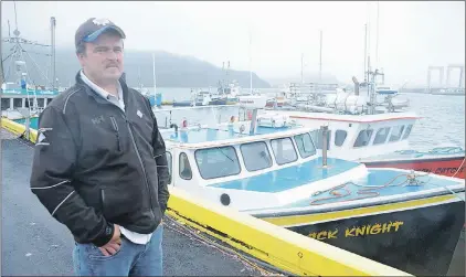  ?? ANDREW ROBINSON/THE COMPASS ?? Leonard Mulrooney Jr. of Jerseyside, Placentia, followed in his parents’ footsteps to make a living in the fishery.