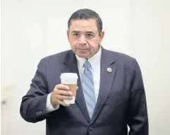  ?? ?? TROUBLE BREWS: US Representa­tive Henry Cuellar leaves a meeting with House Democrats in Washington.