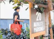  ?? Christina House For The Times ?? DOORDASH deliverer Ricky Sierra picks up an order at Mendocino Farms in El Segundo.