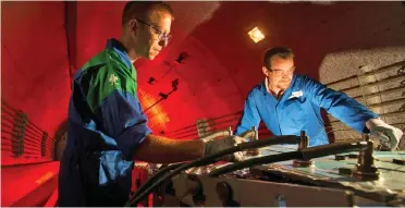  ??  ?? Uncertain future: Two engineers at work at one of GKN’s aerospace facilities