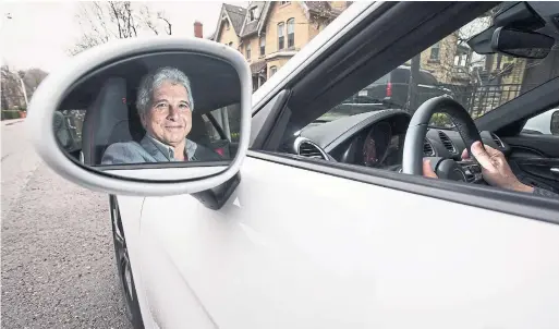  ?? BERNARD WEIL/TORONTO STAR ?? Peter Oundjian puts Toronto in his rear-view mirror as he takes a borrowed Porsche for a ride.