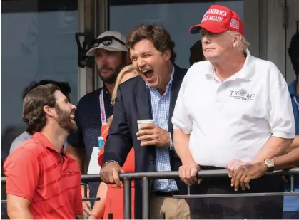  ?? Photograph: Justin Lane/EPA ?? Fox News host Tucker Carlson and former US president Donald Trump at the LIV Golf Invitation­al Bedminster, NJ, on 31 July 2022.