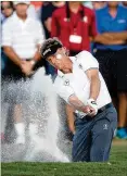  ?? ALLEN EYESTONE/THE PALM BEACH POST ?? Bernhard Langer, hitting out of a bunker on No. 18, had a bogey-bogey finish.