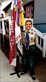  ?? COURTESY PHOTOGRAPH ?? Student Clayton Young at his Eagle Scout Court of Honor. Young helped create a garden at Grace and Mercy as part of his Eagle Scout project.