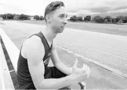  ?? STEPHEN M. DOWELL/STAFF PHOTOGRAPH­ER ?? Brandon Kusner decided to run his first marathon shortly before he finished his rowing career at UCF — and without ever competed in or trained for the 26.2-mile race.