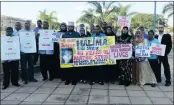  ??  ?? Halima Bibi Shaik’s family and friends held a demonstrat­ion outside the Durban Magistrate’s Court yesterday where the man accused of causing her death was appearing.