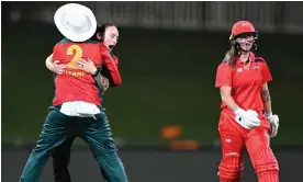  ?? Photograph: Steve Bell/Getty Images ?? Sarah Coyte celebrates with Tasmania teammate Elyse Villani after bowling out South Australia’s Annie O'Neil at Blundstone Arena in Hobart.