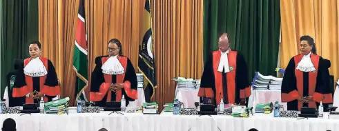  ?? ?? SUPREME COURT judges led by Chief Justice Martha Koome (second from left) about to begin hearing submission­s from counsel representi­ng Ruto, on September 1.