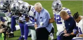  ?? MATT YORK — THE ASSOCIATED PRESS ?? The Cowboys, led by owner Jerry Jones, center, take a knee national anthem before Monday’s game in Glendale, Ariz. prior to the
