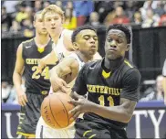  ?? MARC PENDLETON / STAFF ?? Donnie Shelton (with ball) led the Elks with 13 points in their 44-38 loss to Mason in a district final Saturday at UD Arena.