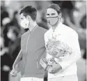  ?? JULIAN FINNEY GETTY IMAGES ?? Novak Djokovic (left) and Rafael Nadal are two of the best ever.