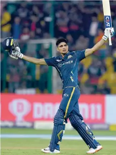  ?? — AFP ?? Gujarat Titans’ Shubman Gill celebrates after scoring a century.