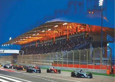  ?? Rex Features ?? Action from the Bahrain Grand Prix earlier this year. Motorsport’s governing body, the FIA, confirmed a switch in dates between the Bahrain race, which is to take place on April 8, and the Chinese GP, which will be held in Shanghai a week later.