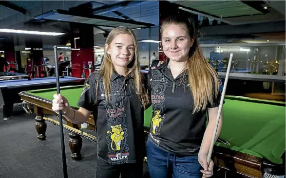  ??  ?? Alexandria Endres, left, and Alyxandra Jones are two of New Zealand’s 15 top junior pool players.
