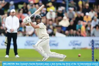  ?? — AFP ?? WELLINGTON: New Zealand’s Rachin Ravindra plays a shot during day three of the 1st Internatio­nal cricket Test match between New Zealand and Australia at the Basin Reserve in Wellington on March 2, 2024.