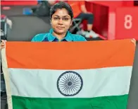  ?? — The Web ?? Indian’s Bhavinaben Patel celebrates her gold medal in the table tennis event at the Paralympic­s in Tokyo on Friday.