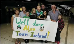  ??  ?? Alan returns home to a hero’s welcome at Dublin Airport.