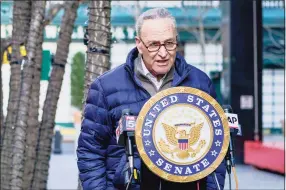  ?? Mary Altaffer / Associated Press ?? Senate Minority Leader Chuck Schumer, D-N.Y., speaks to reporters during a news conference on Tuesday in New York.