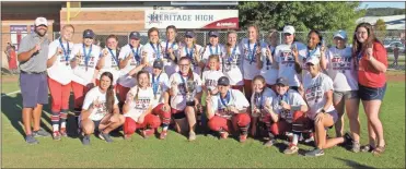  ?? Scott Herpst ?? The Heritage Generals claimed a second consecutiv­e Class 4A state fastpitch softball championsh­ip last Monday, using a game-ending triple play, to beat Marist, 6-3.