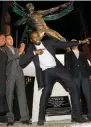  ?? Reuters ?? Usain Bolt poses after the unveiling of his statue in Jamaica. —